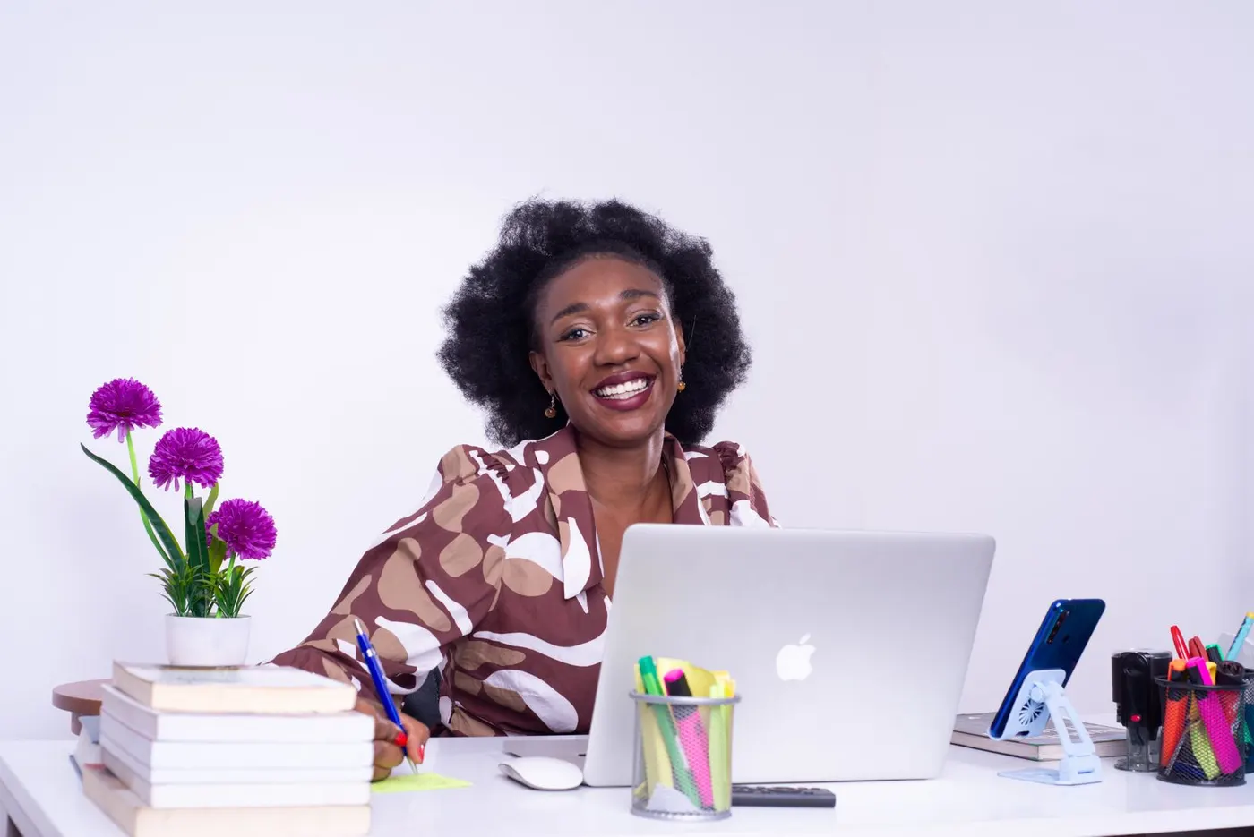 A confident prospective applicant at her desk